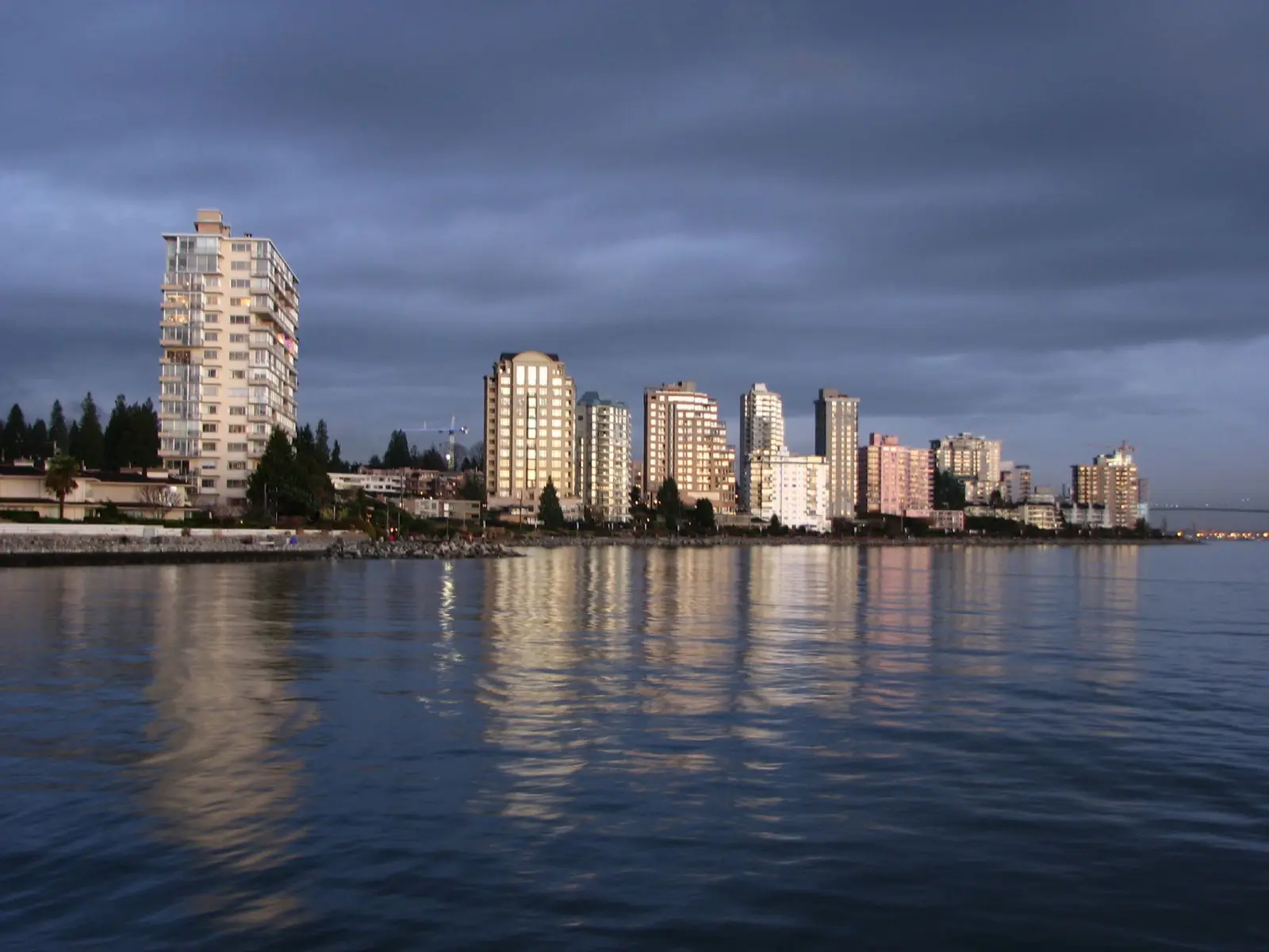Waterfront buildings along the shoreline viewed from Dundarave in West Vancouver