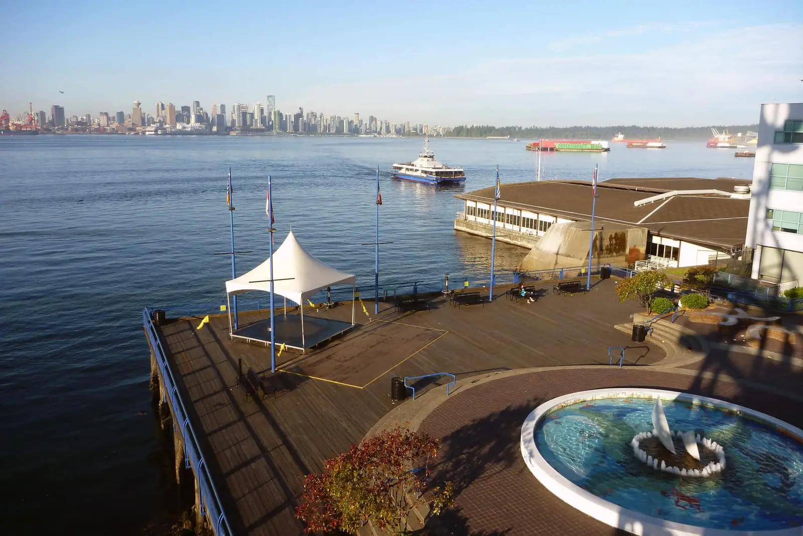 Lonsdale Quay pier with the Vancouver skyline across Burrard Inlet